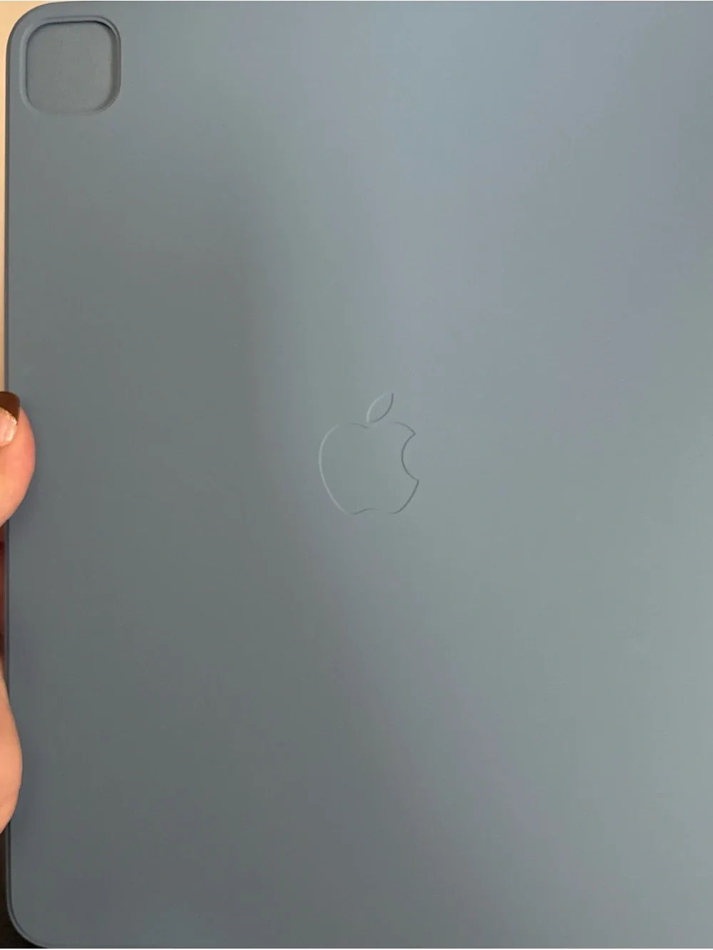 a light blue Apple Smart Folio case for an iPad Pro 12.9